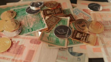 a pile of foreign currency sitting on top of a table